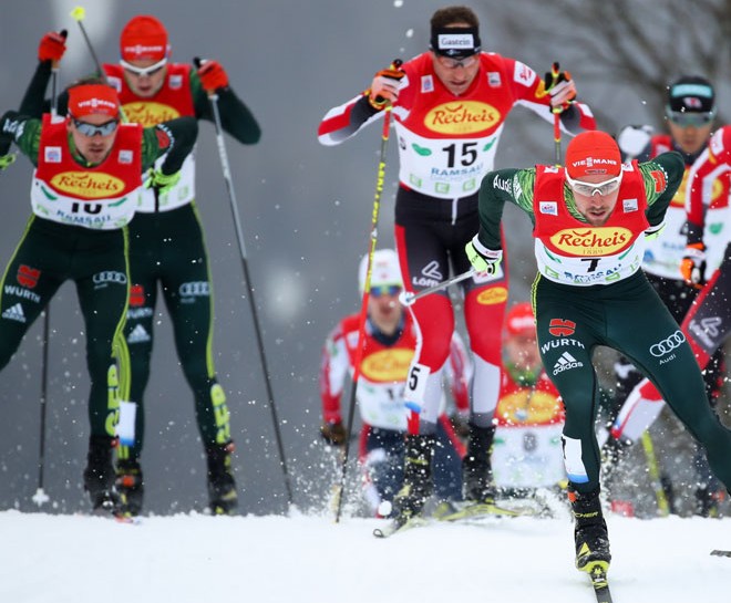 Athletes fighting for the top position.