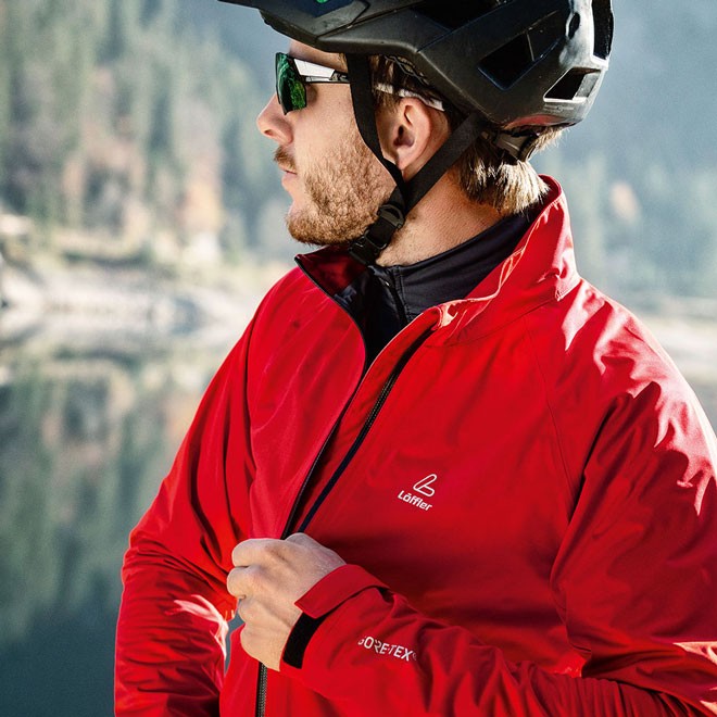 Man posing with Löffler jacket.